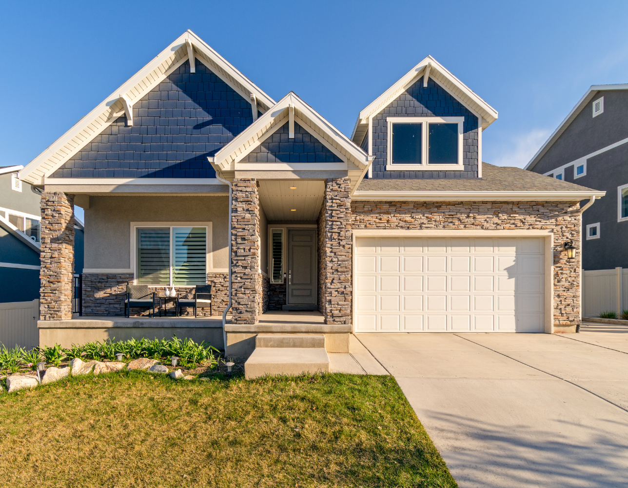 Beautiful modern home with stone and siding exterior