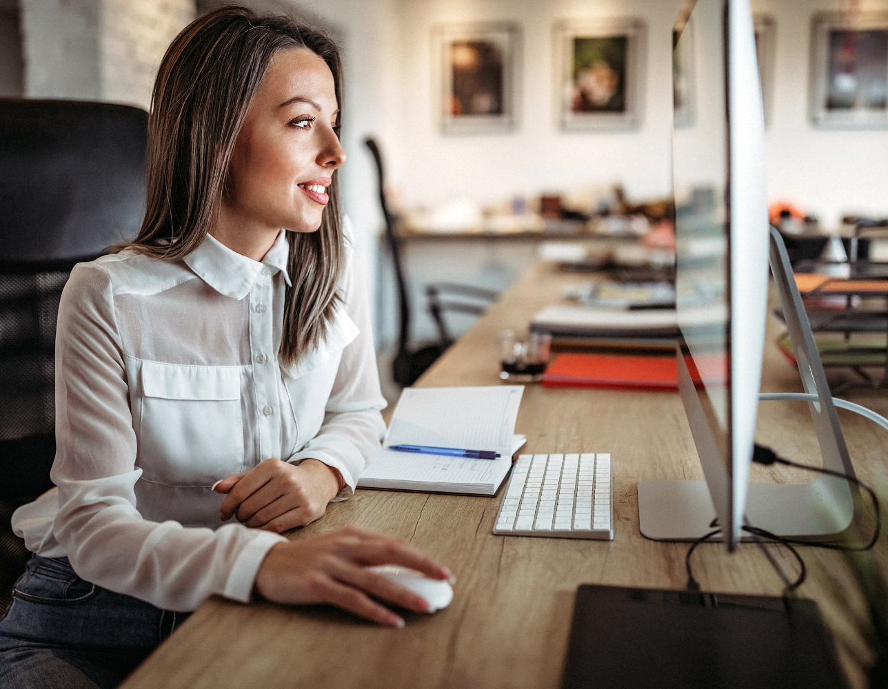 Mortgage professional working at computer